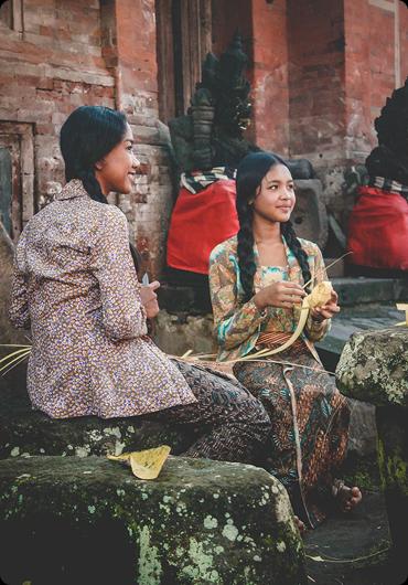 Two Indonesian Girls Sitting Together